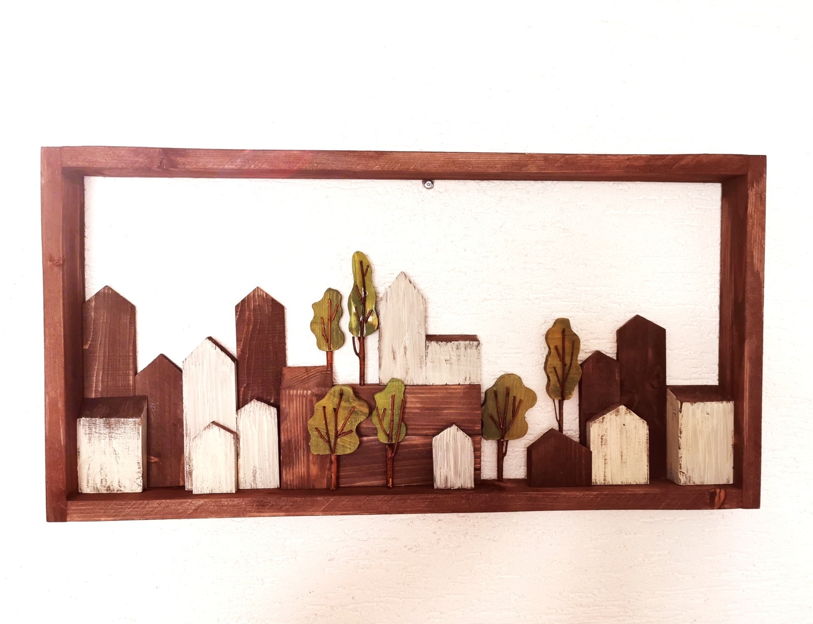 Dřevěný obraz se symbolickými domečky