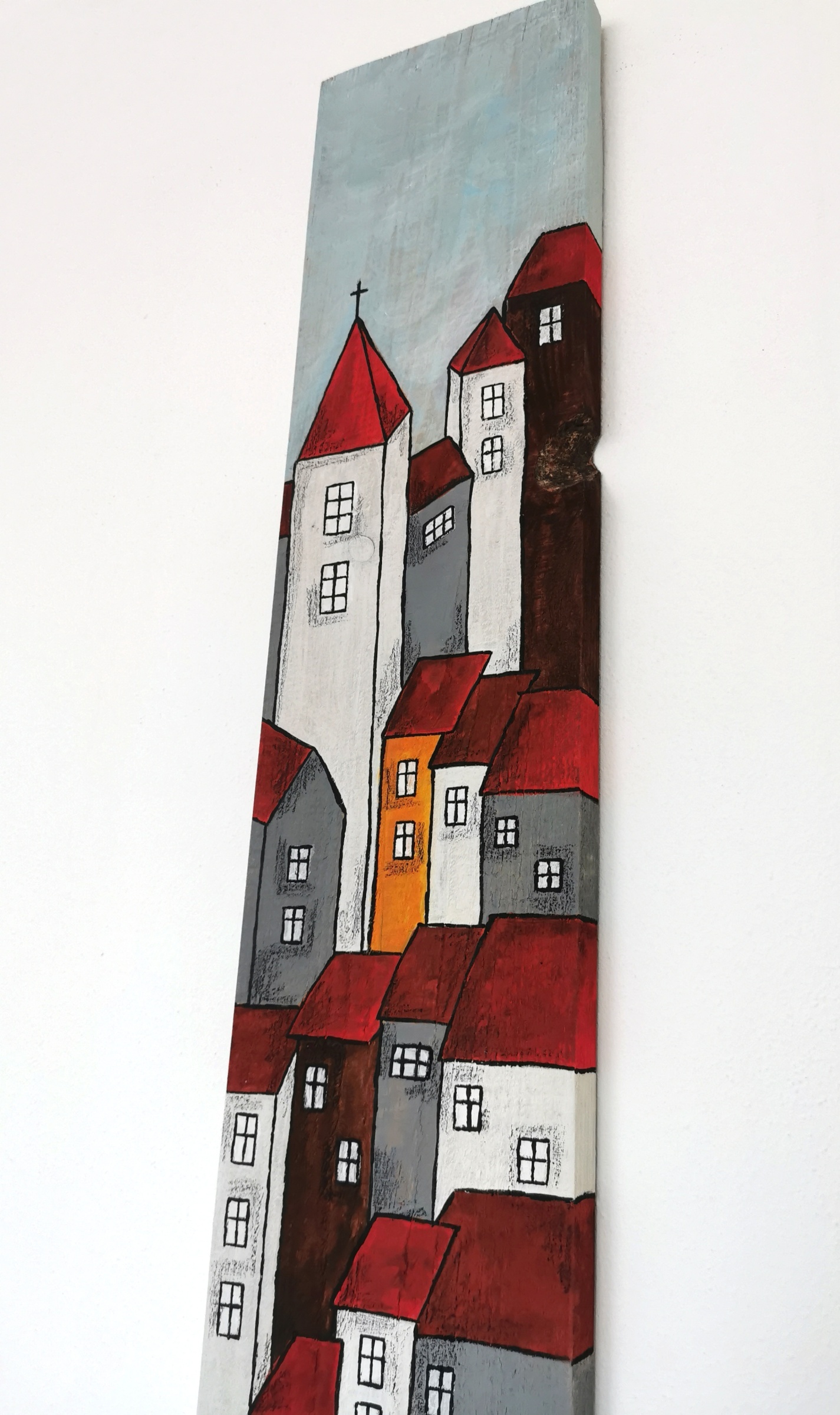 Velký dřevěný obraz s barevnými domečky