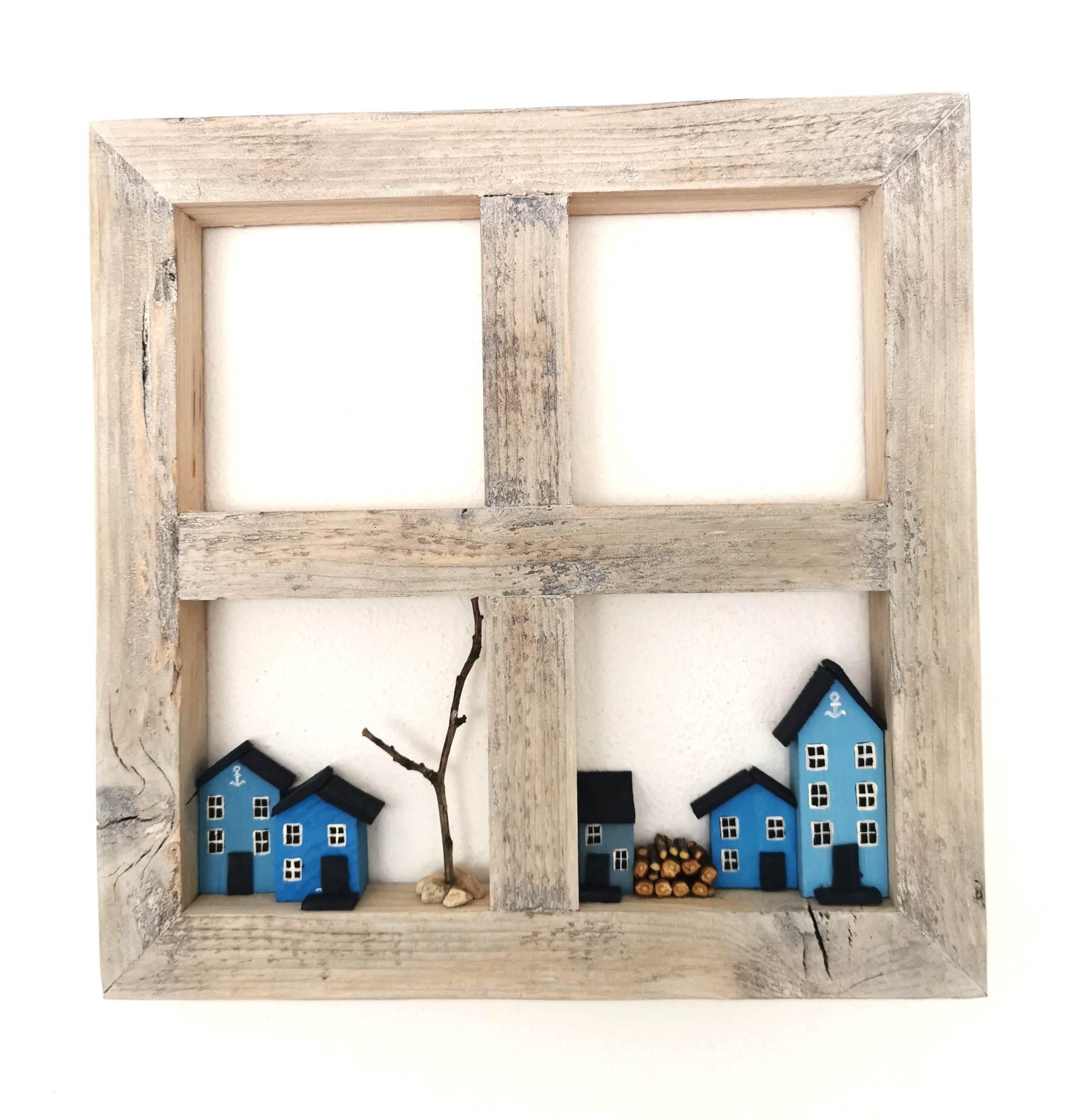 Obraz dřevěné okénko s modrými domečky